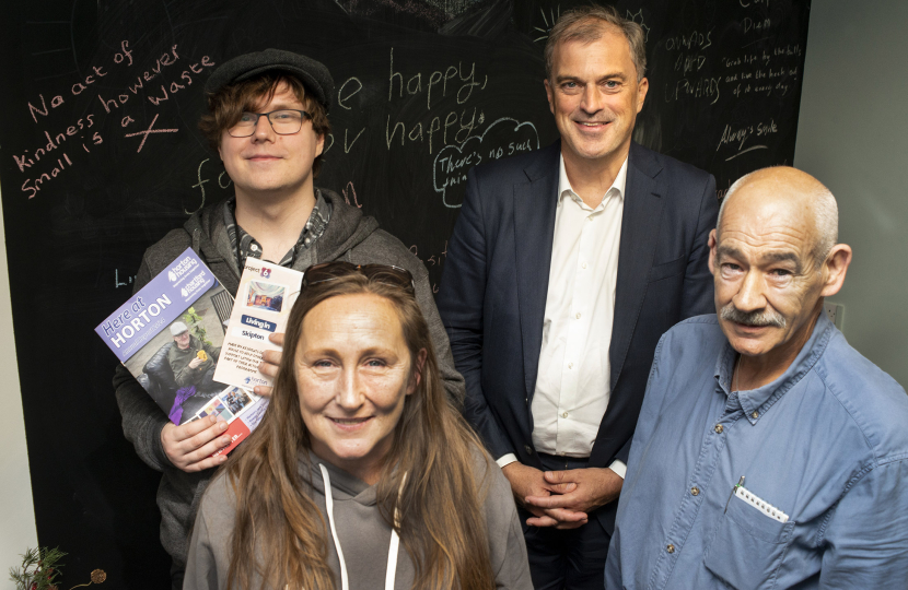 Julian with Lucas Lis (top left) a former resident (bottom left) and a volunteer (bottom right)