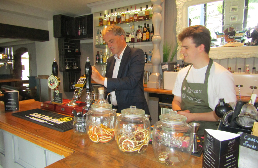 Julian at the Square and Compass at North Rigton pulling a pint