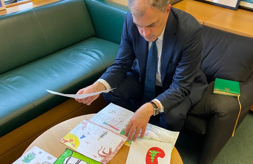 Julian Smith MP judging Christmas Card competition