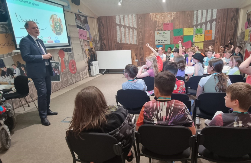 Julian speaking to students in the Parliament Education centre