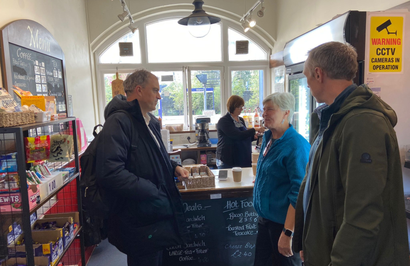 Julian buying a drink in the cafe