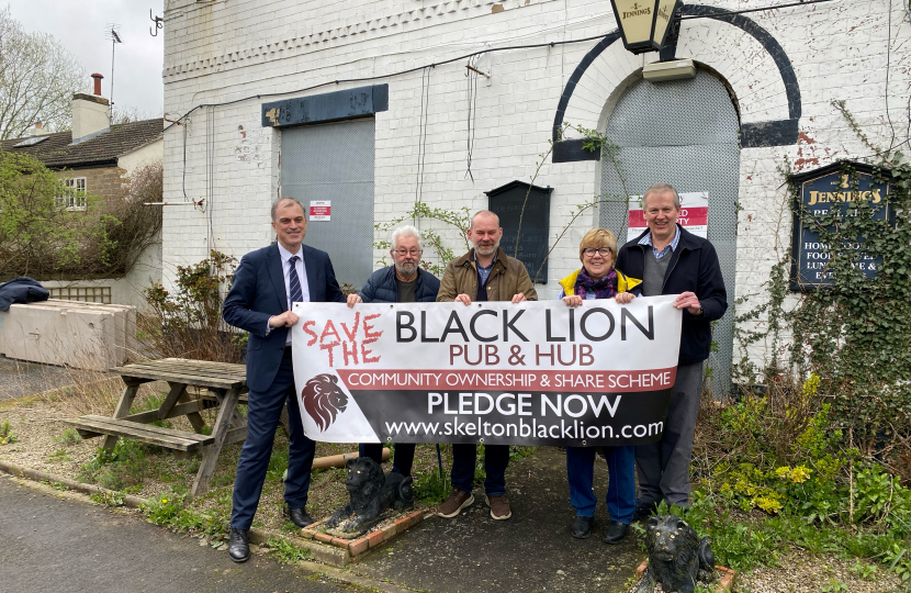 Julian and members of the team outside the pub