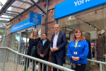 Julian Smith MP with Mary, Yorkshire Cancer Research’s Retail Area Manager (right) and Yorkshire Cancer Research data analysis team. 