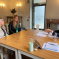 Julian Smith MP speaking with Tia-Joanne Fenton (left) and Kat Hawley (centre)