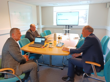 Julian Smith meeting with Stuart Carlton (left)