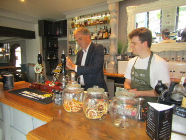 Julian at the Square and Compass at North Rigton pulling a pint