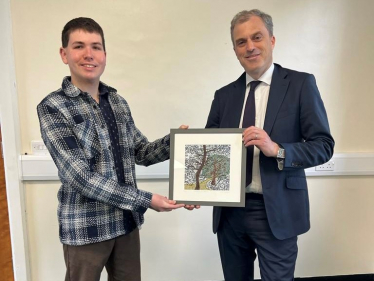 James presenting artwork to Julian