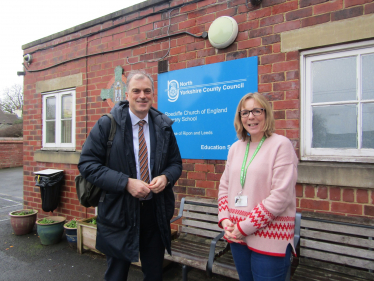 Julian meeting headteacher Lesley Briggs