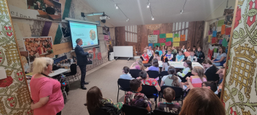 Julian speaking to students in the Parliament Education Centre